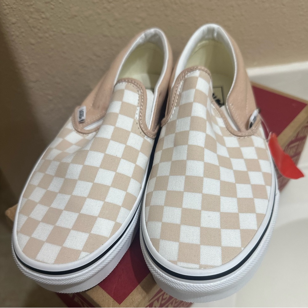Vans checkered slip ons